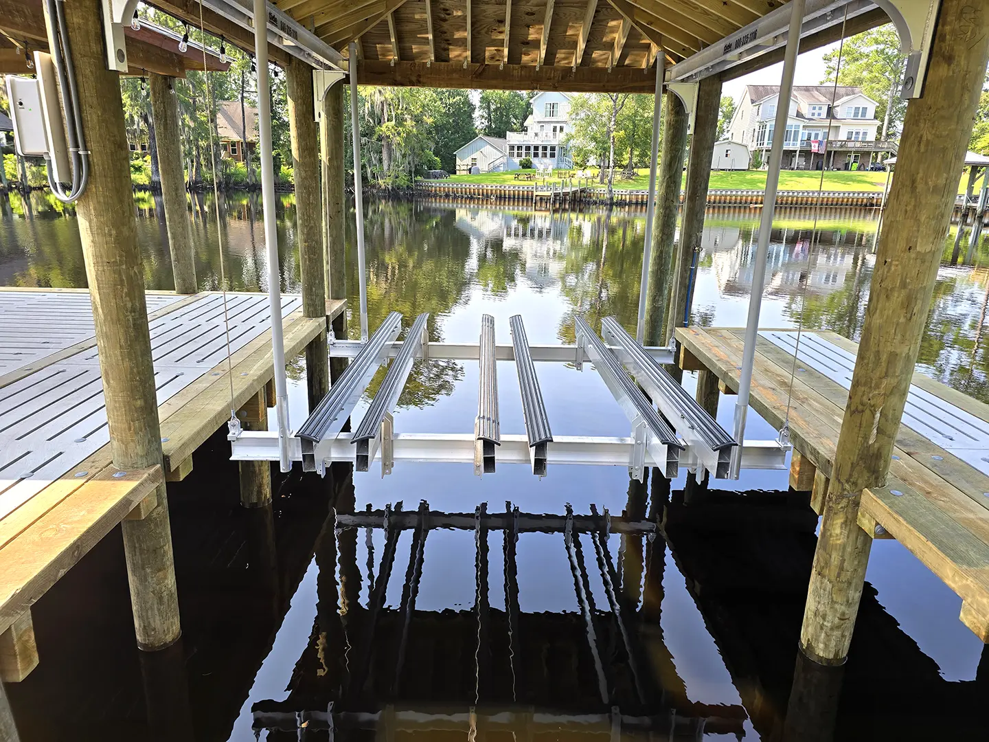 Hog Slat Dock with Boathouse, Boat Lift, Finger Piers and Covered Platform on Brices Creek