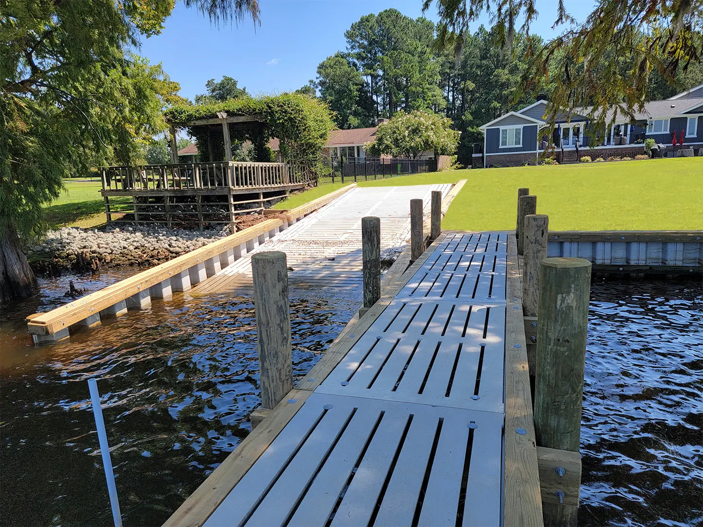 Hog Slat Dock with Boathouses, Boat Lift, Jetski Lift and Boat Ramp on Trent River