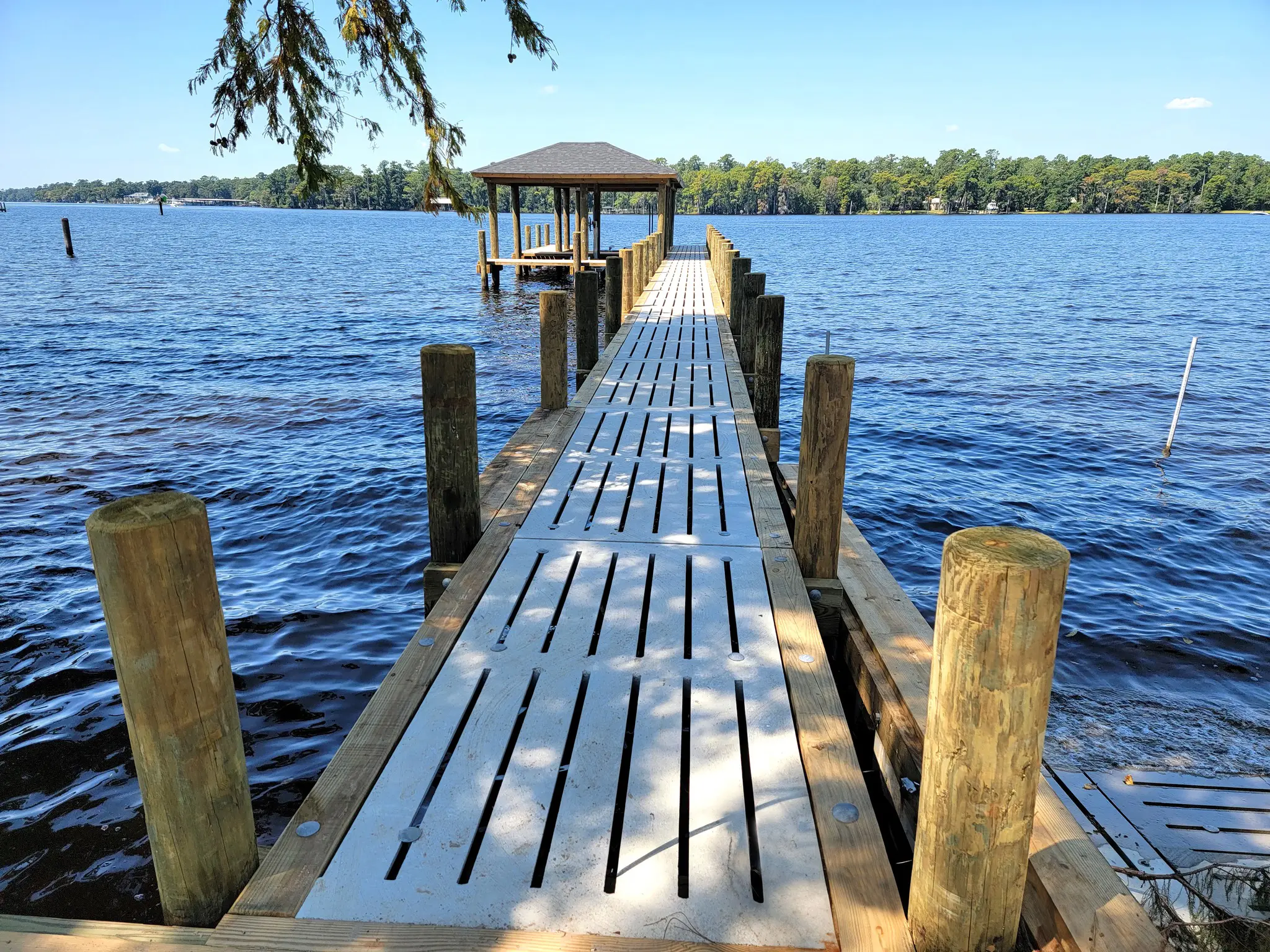Hog Slat Dock with Boathouses, Boat Lift, Jetski Lift and Boat Ramp on Trent River