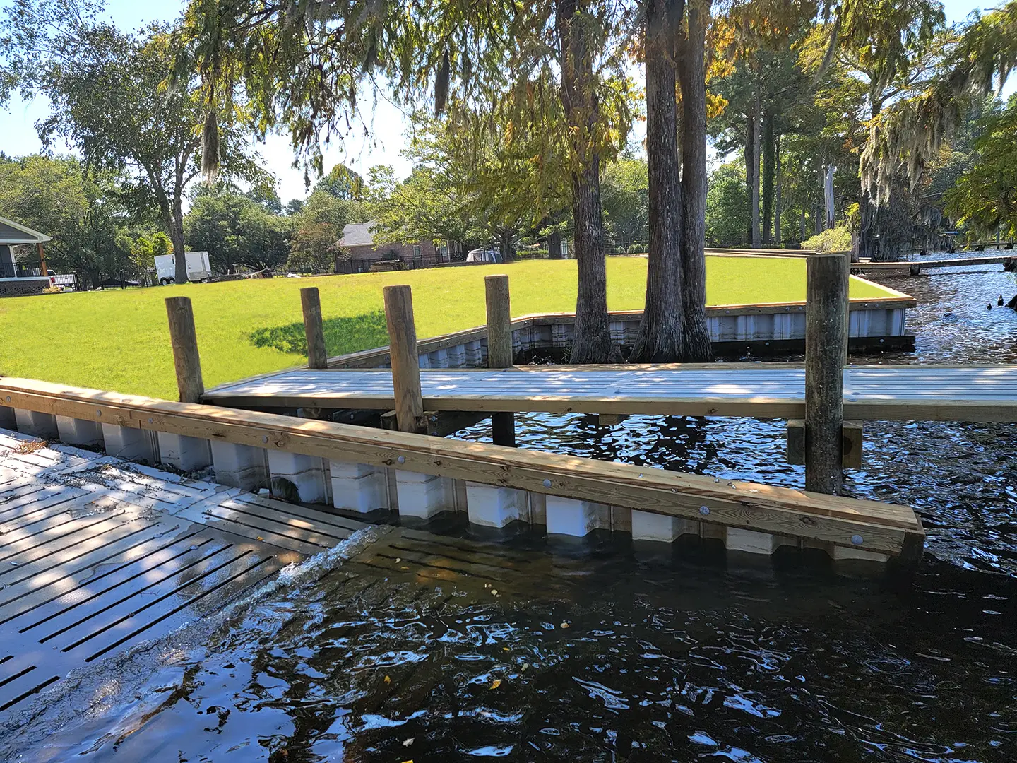 Hog Slat Dock with Boathouses, Boat Lift, Jetski Lift and Boat Ramp on Trent River