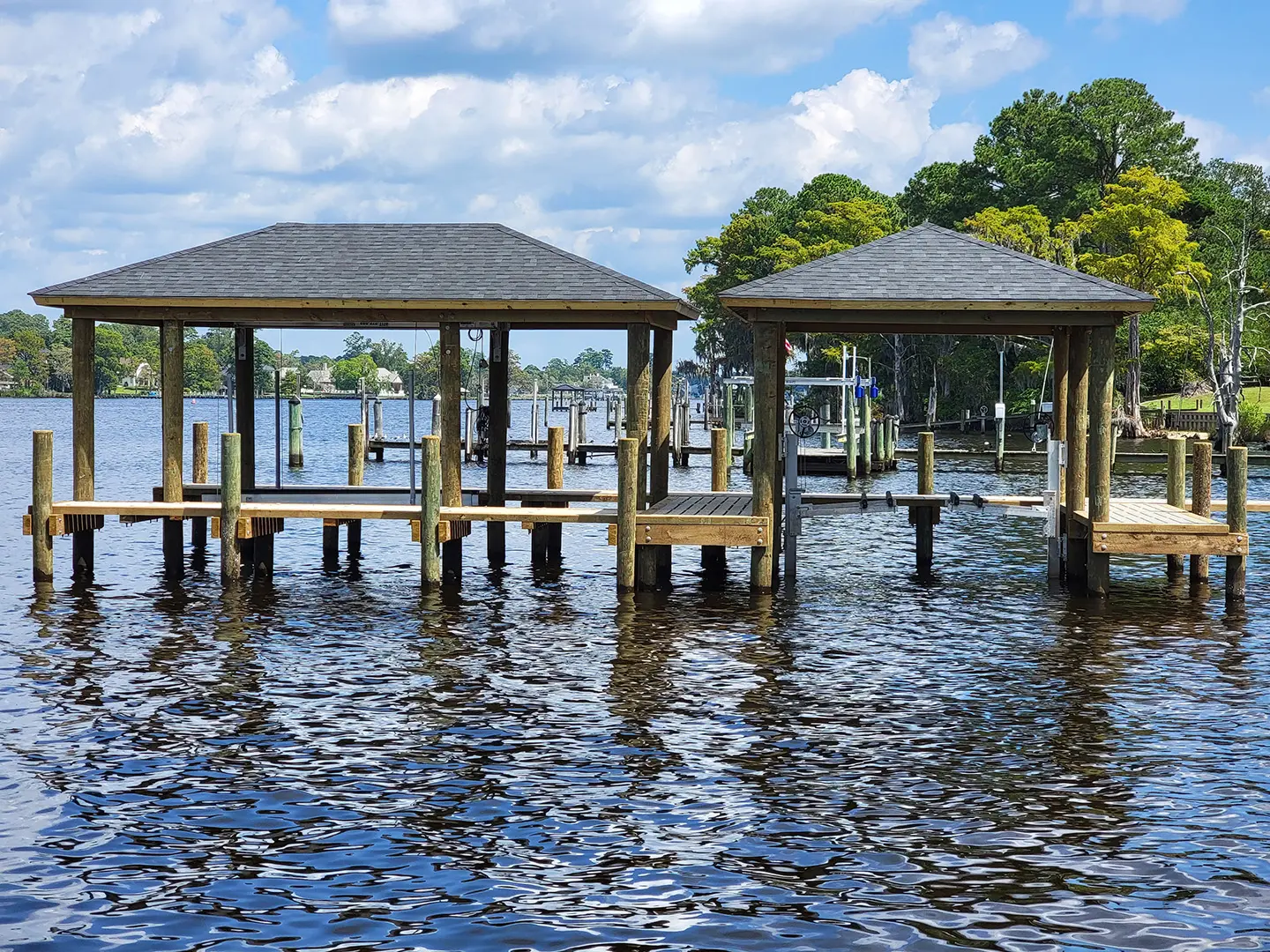 Hog Slat Dock with Boathouses, Boat Lift, Jetski Lift and Boat Ramp on Trent River