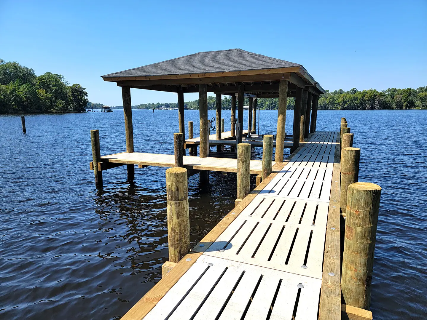 Hog Slat Dock with Boathouses, Boat Lift, Jetski Lift and Boat Ramp on Trent River