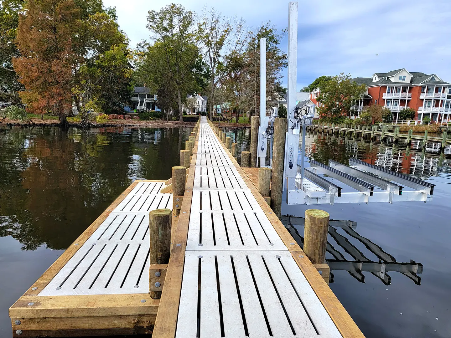Ultimate Watersports hog slat dock with Jetski Lifts & Boat Lift on Neuse River
