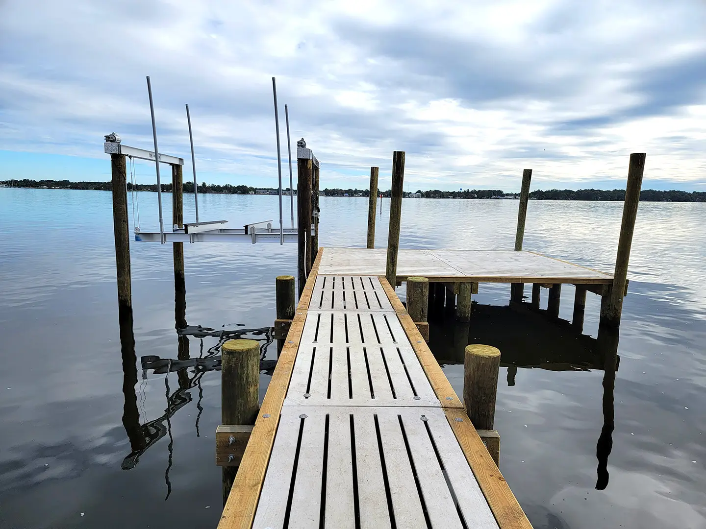 Ultimate Watersports hog slat dock with Jetski Lifts & Boat Lift on Neuse River