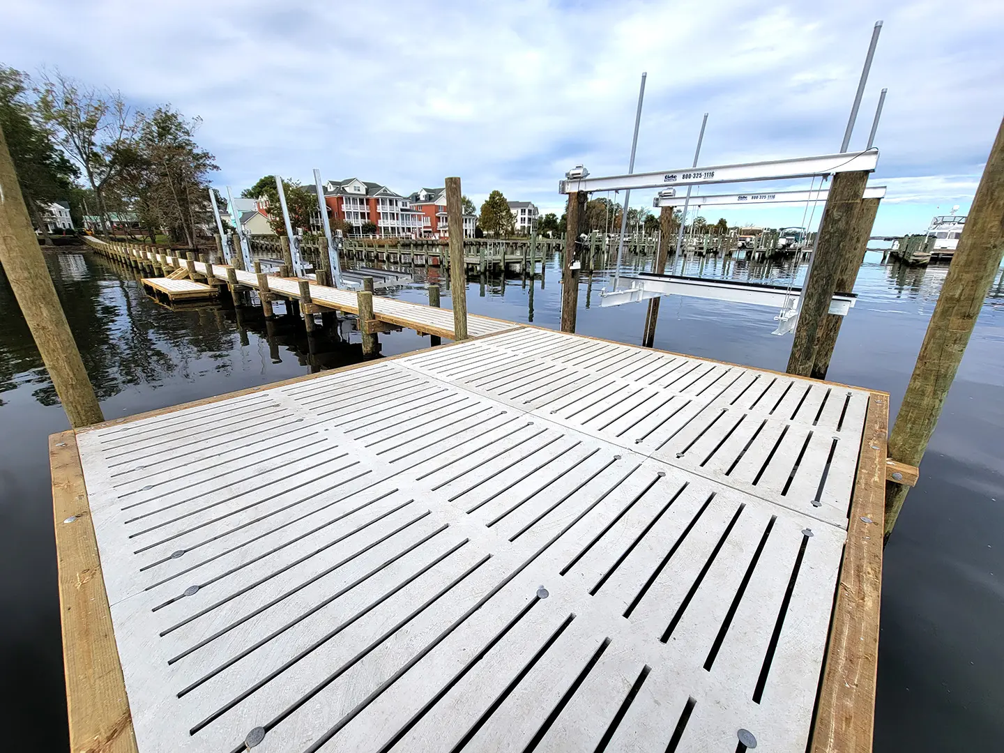 Ultimate Watersports hog slat dock with Jetski Lifts & Boat Lift on Neuse River