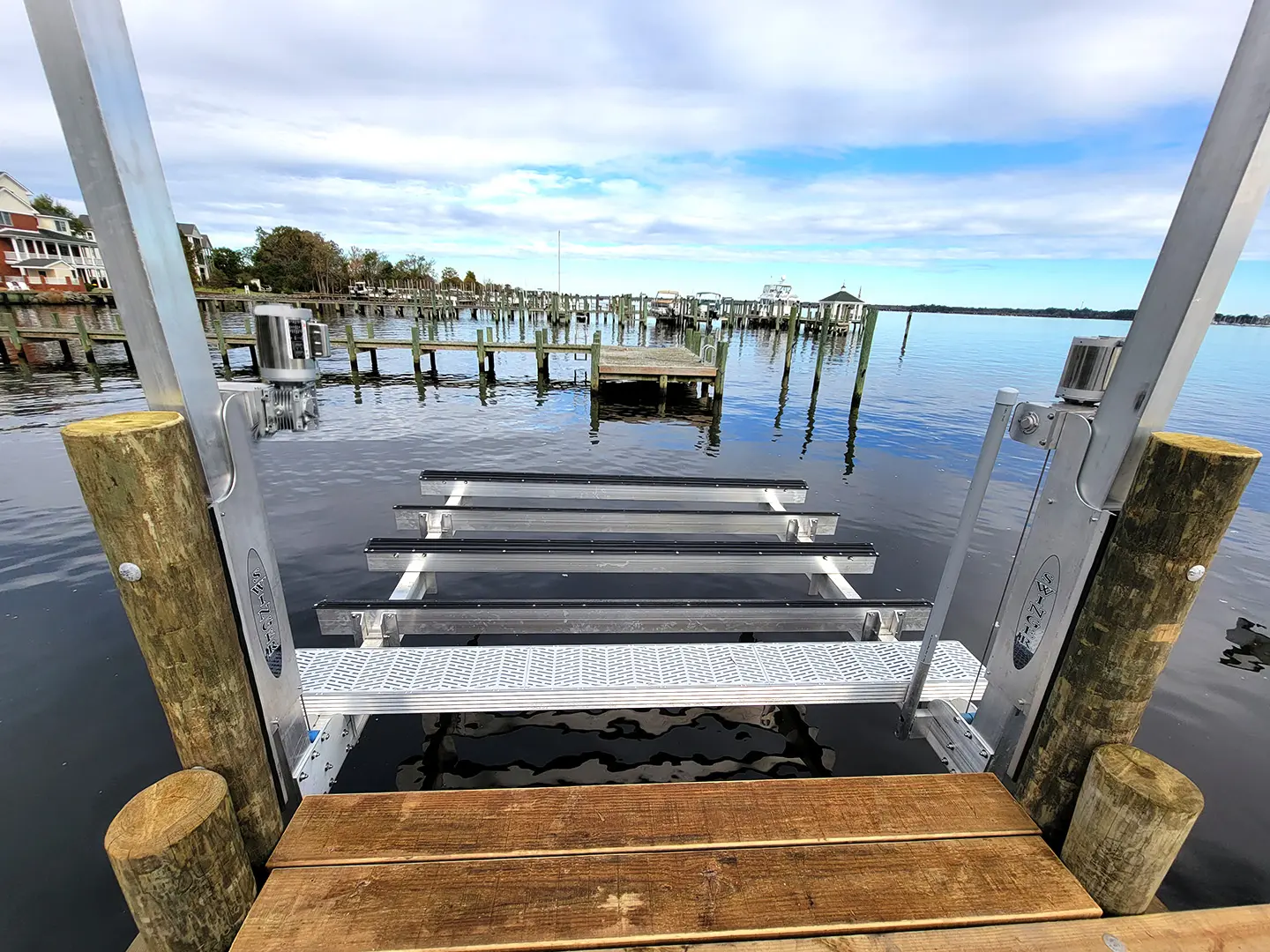 Ultimate Watersports hog slat dock with Jetski Lifts & Boat Lift on Neuse River